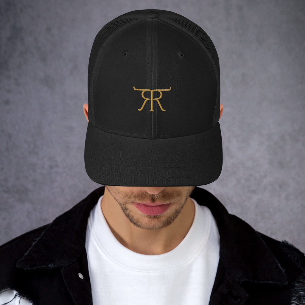 Black Retire Ready Texas trucker hat with copper cattle-brand embroidery shown from the front